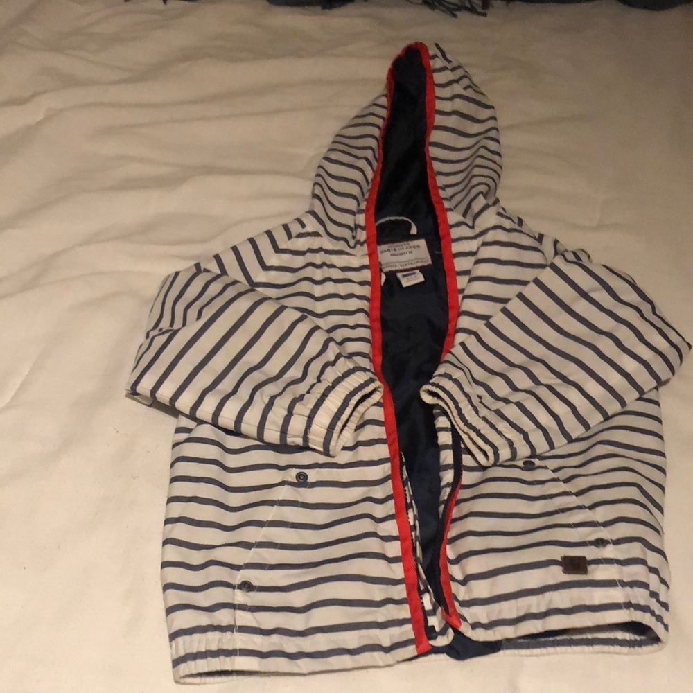 Blue and white with red trim wind breaker